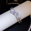 Pulseira estilo francês, com zircônia cúbica ultra brilhante em formato de estrela e pérolas - uma joia luxuosa e elegante, um design novo e deslumbrante para mulheres