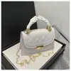 Bolsa de Corrente Romboidal de Alta Qualidade Feminina 2024 Primavera e Verão Nova Bolsa Quadrada Pequena Simples Casual Estilo Ocidental Nicho Bolsa de Ombro