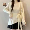 Suéter de punto holgado y casual con cuello halter en V y manga larga para mujer, nuevo suéter top de talla grande para principios de otoño que cubre el abdomen