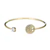 Pulseira Cross-Border Popular Jewelry com Árvore da Vida Vazada, Pulseira Feminina Personalizada com Abertura Ajustável e Strass, Disponível para Venda