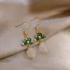 Pendientes de Borla con Cuentas de Cristal de Flor de Loto Goteando Aceite Nuevo Chinoiserie Lujo Accesible Pendientes de Gancho para Oreja de Nicho Pendientes Elegantes de Gama Alta para Mujer