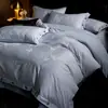 Conjunto de quatro peças de outono e inverno grau A com design jacquard de algodão puro espesso, oferecendo uma experiência de cama luxuosa e elegante