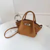 Bolso de Mano Tipo Cubo de Alta Gama Estilo Comercio Exterior para Mujer, Nuevo Bolso de Hombro Casual Vintage Invierno 2026, Bolso Cruzado de Nicho
