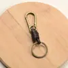 Acessórios de chaveiro tecidos à mão de fábrica fivela de placa corda de couro versátil retrô chaveiro semiacabado pendente DIY