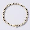 Pulsera elástica pequeña fragante estilo coreano color cuentas de arroz cuentas doradas mezcla y combina tejida lujo ligero alto sentido pulsera explosiva venta al por mayor