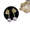 Pendientes Colgantes de Sirena Morados Fantasía Retro Franceses con Perlas Pendientes de Flor Estéreo Dorados de Alta Gama a la Moda