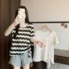 Camiseta de Verano 2026 Estilo Nuevo Talla Grande para Mujer con Bloques de Color, Rayas, Diseño Calado de Manga Corta y Cinta Irregular, Top Ligero