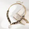 Pendientes de botón de espiga de trigo con incrustaciones de diamantes de plata de aguja transfronterizos europeos y americanos, Collar simple de borla con perlas, Juego de joyería de nicho de lujo ligero al por mayor