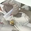 Botón de Metal Semi-circular Hueco Incrustado con Diamantes de Moda Exquisita para Abrigo Traje Suéter de Punto Chaqueta Suéter Hebilla Decorativa