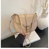 Bolso de sillín de alta gama transfronterizo de nicho para mujer, nuevo y elegante bolso vintage para el teléfono del día a día, bolso versátil de hombro y cruzado