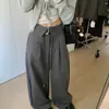 Foto real dos novos calças casuais de moda de alta qualidade coreanas Dongdaemun outono 2026 para mulheres com design coreano e amarração na cintura