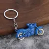 Chaveiro de Motocicleta para Venda Quente Transfronteiriça Pingente Roda de Motocicleta Colorida Grande Pode se Mover