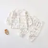 Conjunto de duas peças de algodão puro para bebê, adequado para bebês de 0 a 1 ano, inclui um cardigã de algodão Classe A e calça com botões entre as pernas ajustável, disponível para meninos e meninas
