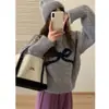 Suéter de Punto Coreano Dulce Reductor de Edad con Lazo y Cuello Redondo de Manga Larga para Mujer Otoño e Invierno Suave y Ceroso Prendas de Punto Exteriores para Mujer