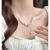 Novo colar de pérolas com pingente de estrela tridimensional, design criativo de nicho, delicado e suave, corrente de clavícula elegante e sofisticada