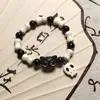 Pulsera de concha con cuentas de garra de gato al por mayor para mujer, diseño dulce de nicho para primavera y verano, joyería Joker de alto valor para amigas