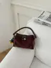 Bolso de mano de alta gama de moda transfronteriza para mujer, bolso cuadrado pequeño retro casual nuevo, versátil para el trabajo, bolso de hombro y bandolera