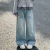 Nueva colección de primavera y otoño: Conjunto de dos piezas para niña: cárdigan de manga larga estilo preppy con retazos y pantalones de mezclilla con estampado de estrellas dulces.