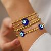 Pulseira de corda de pedra banhada a cobre 18K com contas de ouro verdadeiro e totem turco de mau-olhado estilo étnico europeu e americano para mulheres