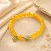 Pulseira de ágata amarela com contas para mulheres, acessório cultural e criativo de loop único de jade Hetian, ágata amarela natural