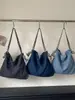 Colección nueva 2026: bolso de mano de alta gama, estilo vintage, de nicho para mujer, con una estética casual y relajada, diseño versátil, construcción ligera y gran capacidad