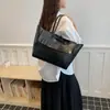 Bolso tote casual de alta gama transfronterizo para mujer, nuevo bolso de mano simple versión coreana 2026, bolso de hombro vintage para el día a día