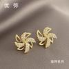 Brincos Pequenos de Catavento Giratórios com Zircônia Incrustada de Cobre Celebridade da Internet Dourado Ins Tendência Elegante Simples Brincos Atacado Tendência