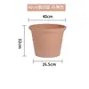 Maceta de cerámica de imitación de plástico Zhixiao para balcón, de diámetro mediano y grande, gruesa, creativa, anticaídas y duradera.