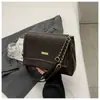 Nova Bolsa Feminina de Moda Nicho de Grande Capacidade Primavera 2026, Bolsa de Ombro com Corrente Texturizada, Bolsa Tote Transversal