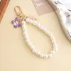 Estilo Tweed Lazo Cadena de Perlas Llavero Colgante para Bolso de Moda Femenina Estilo Ins Cubierta de Auriculares Colgante para Teléfono Móvil
