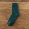 Calcetines de tubo otoño e invierno color liso calcetines de rizo forrados de felpa gruesos invierno hombres y mujeres calcetines de toalla cálidos de lana estirada fabricantes