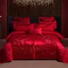 Juego de cuatro piezas de alta gama para boda 60S de algodón de fibra larga en rojo brillante con bordado de algodón puro para recién casados
