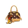 Bolsa de mão feminina transfronteiriça, nova coleção outono/inverno, design moderno, fresco e doce, bolsa tote em formato de concha, estilo leve de luxo com bolinhas, bolsa de ombro e bolsa transversal feminina