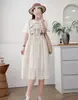Vestido Curto de Verão 2026 Estilo Japonês Desenho Animado Pássaro Bordado Gola Alta Feminino Soltinho Manga Curta Jeans Atacado