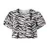 2025 Verano Nuevo Moda Callejera Femenina Europea y Americana Conjunto de Top con Estampado Animal + Falda Corta 2725 Poliéster