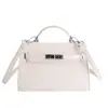 Bolsa de Mão Kelly Minimalista de Luxo para Mulheres, Novo Modelo Primavera 2026 com Fecho Padrão Pedra, Bolsa Transversal Elegante para o Dia a Dia