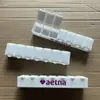 Venta caliente mercado de EE. UU. tamaño pequeño letras 7 compartimentos caja de medicinas grado alimenticio caja de medicinas de siete compartimentos con braille caja de medicinas semanal