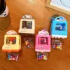 Llavero Creativo de Dibujos Animados Máquina de Garra Brillante Atrapador de Bolas Juguete para Aliviar el Estrés Colgante Regalo Venta al por Mayor