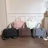 Elegante y versátil bolsa de viaje para viajes cortos, con un compartimento separado para artículos húmedos y secos, un compartimento para zapatos y un asa para facilitar su transporte, adecuada para actividades al aire libre, camping y fitness