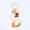 Llavero creativo con letra de grava y borla de cristal epoxi, colgante con letra de mariposa, regalo conmemorativo del Día de San Valentín.