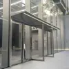 Portas de correr de vidro em liga de alumínio para uso transfronteiriço para edifícios de escritórios, centros de marketing, portas do chão ao teto para centros de vendas e hotéis