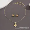 Pingente Olho de Gato em Forma de Gota Brincos de Trevo de Quatro Folhas Femininos Conjunto de Duas Peças Corrente Ondulada Popular de Comércio Exterior Colar com Pedra Preciosa