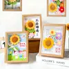 Regalo del Día del Maestro Creativo Souvenir de Alta Gama Adornos de Marco de Fotos con Ramo de Girasol Tejido a Mano con Lana