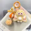 Llaveros y colgantes para bolsos de dibujos animados lindos con flocado 3D para niños de tres años, pequeños accesorios de moda de transmisiones en vivo