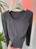 Camiseta Versátil de Manga Larga con Cuello en U y Canalé Suave Estilo Minimalista para Mujer Primavera/Otoño 2026 Estilo Coreano Elegante Que Reduce la Edad Top Combinable