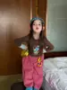 Ropa Infantil Weiniguo 2026 Otoño Nueva Ropa Infantil Camiseta de Color Bloque de Dibujos Animados para Niñas Camiseta Versátil para Jardín de Infancia