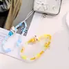Pulseira de Contas Cartoon Fofa Hello Kitty Adequada para Capas de Celular, Cordão Curto Feminino Versátil e Moderno