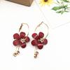 Pendientes de flor de camelia de moda con temperamento coreano, pendientes de circonita con flor de pétalo de alta gama.