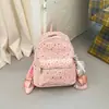 Mochila com estampa de estrelas, grande capacidade, simples e versátil, adequada para estudantes, estilo coreano, com estampas de letras e um visual preppy de faculdade.