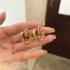 Brincos Redondos de Metal com Agulha de Aço Acetinado Estilo Minimalista Brincos de Tarraxa de Nicho Brincos Versáteis de Luxo Leve Atacado